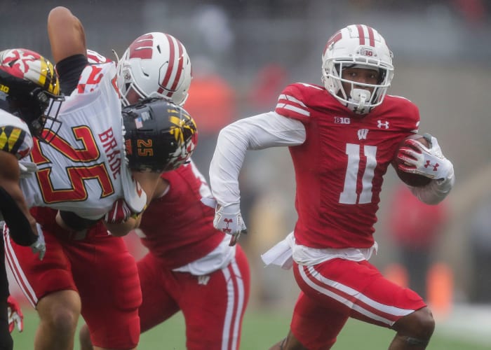 Wisconsin wide receiver Skyler Bell running with the football against Maryland.
